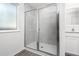 Large walk-in shower with modern gray tile at 3744 Bergamot St, Lake Alfred, FL 33850