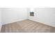 Simple bedroom with carpeted floor and a window at 3732 Bergamot St, Lake Alfred, FL 33850