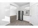 Kitchen with stainless steel refrigerator and white cabinets at 3732 Bergamot St, Lake Alfred, FL 33850