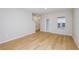 Bright, empty living room with wood-look floors, ready for new furnishings at 4337 Hillock Blvd, Haines City, FL 33844