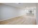Large living area with an open floor plan leading into the kitchen at 4337 Hillock Blvd, Haines City, FL 33844