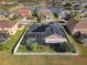 House with solar panels, pool, and fenced backyard at 4204 Sevan Way, Kissimmee, FL 34746