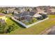 Home with solar panels, pool, and fenced backyard at 4204 Sevan Way, Kissimmee, FL 34746