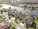 Community overview with water views and surrounding houses at 4204 Sevan Way, Kissimmee, FL 34746