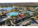 Community pool, tennis courts, and playground are featured in this aerial view at 4204 Sevan Way, Kissimmee, FL 34746