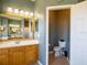 Convenient bathroom with toilet and vanity at 4204 Sevan Way, Kissimmee, FL 34746