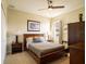 Cozy bedroom with double bed, nightstands, and a large closet at 4204 Sevan Way, Kissimmee, FL 34746