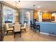 Casual breakfast nook with a glass table and four chairs at 4204 Sevan Way, Kissimmee, FL 34746