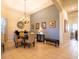 Formal dining room with chandelier and decorative wall art at 4204 Sevan Way, Kissimmee, FL 34746