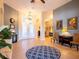 Elegant entryway with tile flooring and view to dining room at 4204 Sevan Way, Kissimmee, FL 34746