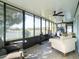 Enclosed Florida room with tiled flooring, and a treadmill at 4204 Sevan Way, Kissimmee, FL 34746