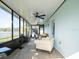 Bright Florida room, perfect for relaxing, with view of backyard at 4204 Sevan Way, Kissimmee, FL 34746