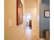 Bright hallway with tile flooring and artwork at 4204 Sevan Way, Kissimmee, FL 34746
