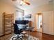 Bright home office with built-in shelving and hardwood floors at 4204 Sevan Way, Kissimmee, FL 34746