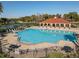 Resort-style community pool with plenty of lounge chairs at 4204 Sevan Way, Kissimmee, FL 34746