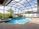 Inviting screened pool and spa with ample deck space at 4204 Sevan Way, Kissimmee, FL 34746