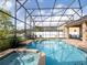 Inviting screened pool and spa with ample deck space at 4204 Sevan Way, Kissimmee, FL 34746