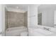 Clean bathroom with a bathtub, shower, and vanity at 6830 Sw 90Th Loop, Ocala, FL 34476