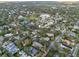 Aerial view of home and neighborhood, close to water at 1716 Palmer Ave, Winter Park, FL 32789