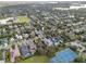 Aerial view of home and surrounding area, near tennis courts at 1716 Palmer Ave, Winter Park, FL 32789