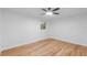 Hardwood floor bedroom with window and ceiling fan at 1716 Palmer Ave, Winter Park, FL 32789