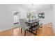 Bright dining room with hardwood floors and modern table set at 1716 Palmer Ave, Winter Park, FL 32789