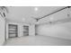 Garage with built-in shelving and extra storage at 1716 Palmer Ave, Winter Park, FL 32789