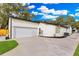 White garage door and concrete driveway at 1716 Palmer Ave, Winter Park, FL 32789