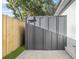 Metal storage shed with wooden fence backdrop at 1716 Palmer Ave, Winter Park, FL 32789