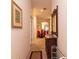 Hallway featuring art, furnishings, with a glimpse of the dining room at 308 New Providence # 308, Davenport, FL 33897