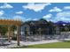 Community pool and sun deck, with shaded tables and lounge chairs at 6086 Sacred Oak Ave, Mount Dora, FL 32757