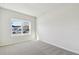 Bright bedroom with carpet and a window at 6075 Sacred Oak Ave, Mount Dora, FL 32757