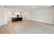 Modern kitchen with island and stainless steel appliances at 6075 Sacred Oak Ave, Mount Dora, FL 32757