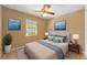 Bedroom with neutral decor and ocean-themed art at 4042 Stonehenge Rd, Mulberry, FL 33860