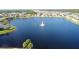 Community with lake and fountain; homes surround the lake at 116 Prestwick Grande Dr, Daytona Beach, FL 32124