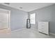 Well-lit bedroom with a dresser and mirrored closet at 116 Prestwick Grande Dr, Daytona Beach, FL 32124