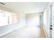 Living room with hardwood floors and an open concept design at 836 Kensington St, Lakeland, FL 33803