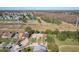 Aerial view of houses next to a golf course at 3017 Jon Jon Ct, Orlando, FL 32822