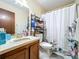 Clean bathroom with shower/tub combo, and a vanity with storage at 3017 Jon Jon Ct, Orlando, FL 32822