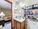 Bathroom with vanity, toilet and view of bedroom at 3017 Jon Jon Ct, Orlando, FL 32822
