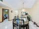 Dining room with kitchen pass through and access to other rooms at 3017 Jon Jon Ct, Orlando, FL 32822