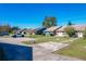 Multiple houses view with parking and a grassy area at 3017 Jon Jon Ct, Orlando, FL 32822