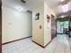 Clean hallway with tiled floors and storage at 3017 Jon Jon Ct, Orlando, FL 32822