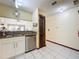 Kitchen with granite countertops and stainless steel dishwasher at 3017 Jon Jon Ct, Orlando, FL 32822