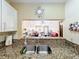 Kitchen features granite countertops and double sink at 3017 Jon Jon Ct, Orlando, FL 32822