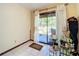 Eat-in kitchen with sliding glass doors leading to the patio at 3017 Jon Jon Ct, Orlando, FL 32822