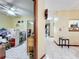 View of living room from partially-packed bedroom at 3017 Jon Jon Ct, Orlando, FL 32822