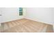 Bright bedroom features neutral carpet, window with blinds, and fresh paint at 13490 Leaping Water Way, Astatula, FL 34705