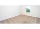 Bright bedroom featuring neutral carpet, a window and fresh paint at 13490 Leaping Water Way, Astatula, FL 34705