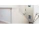 Bright staircase showcasing white trim and gray vinyl flooring near entryway at 13490 Leaping Water Way, Astatula, FL 34705
